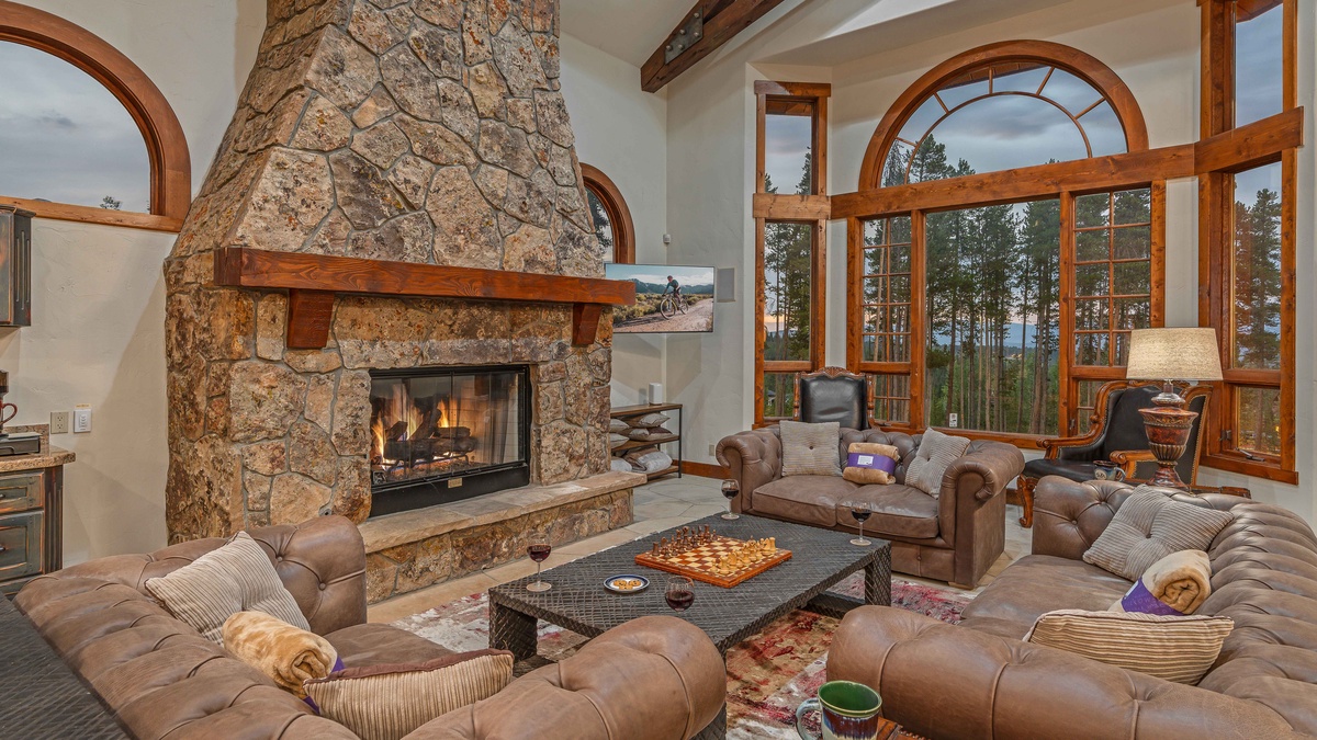 Main level great room with TV and gas fireplace