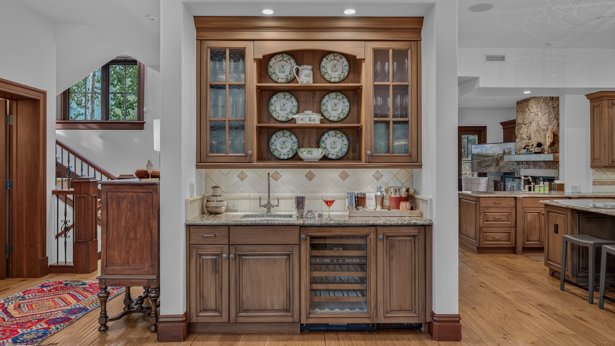 Wet Bar, Main Level - Cabinetry with countertop and shelving