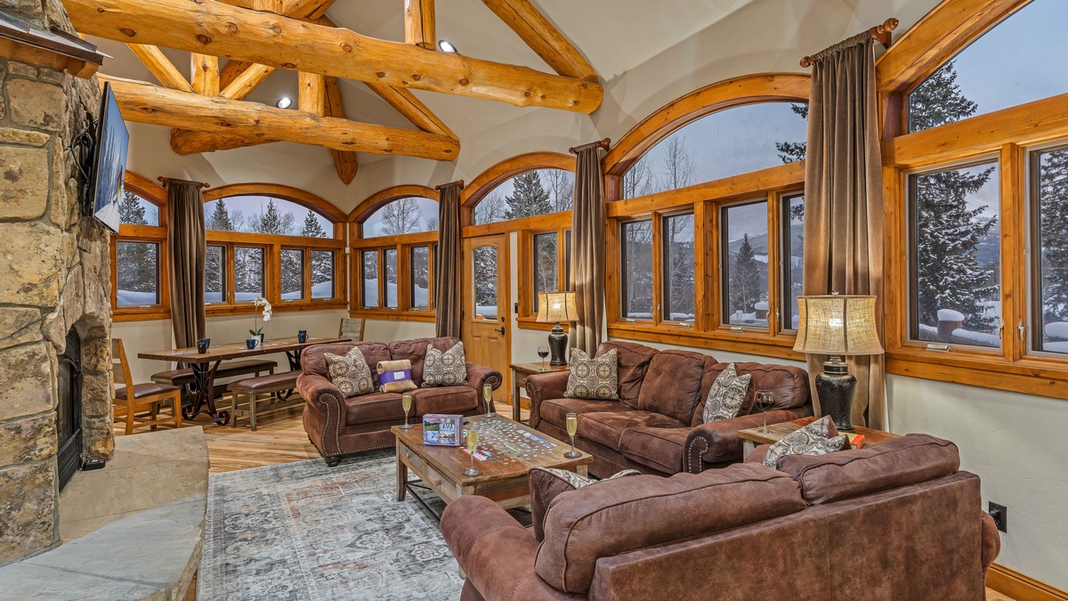 Enjoy the views from the cozy great room, with access to hot tub balcony