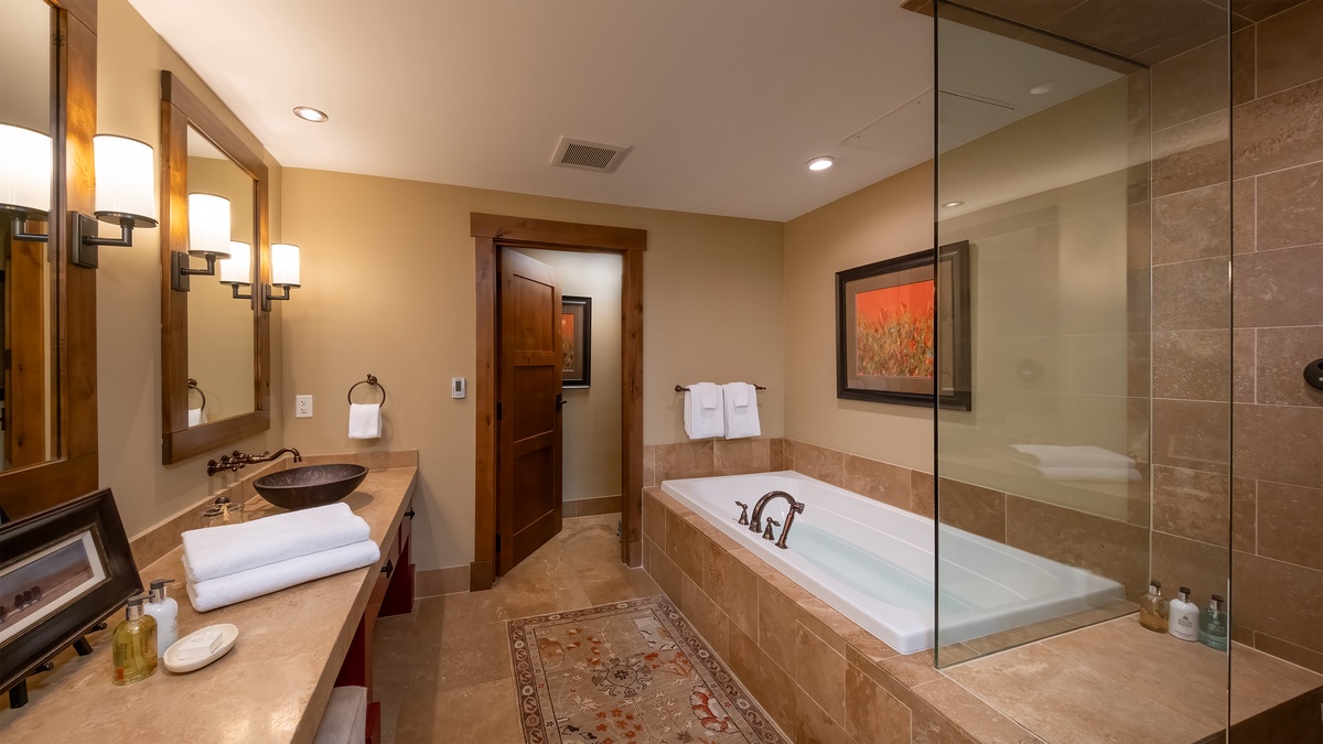 Bedroom 2, Main Level - Ensuite with soaking tub and walk-in shower