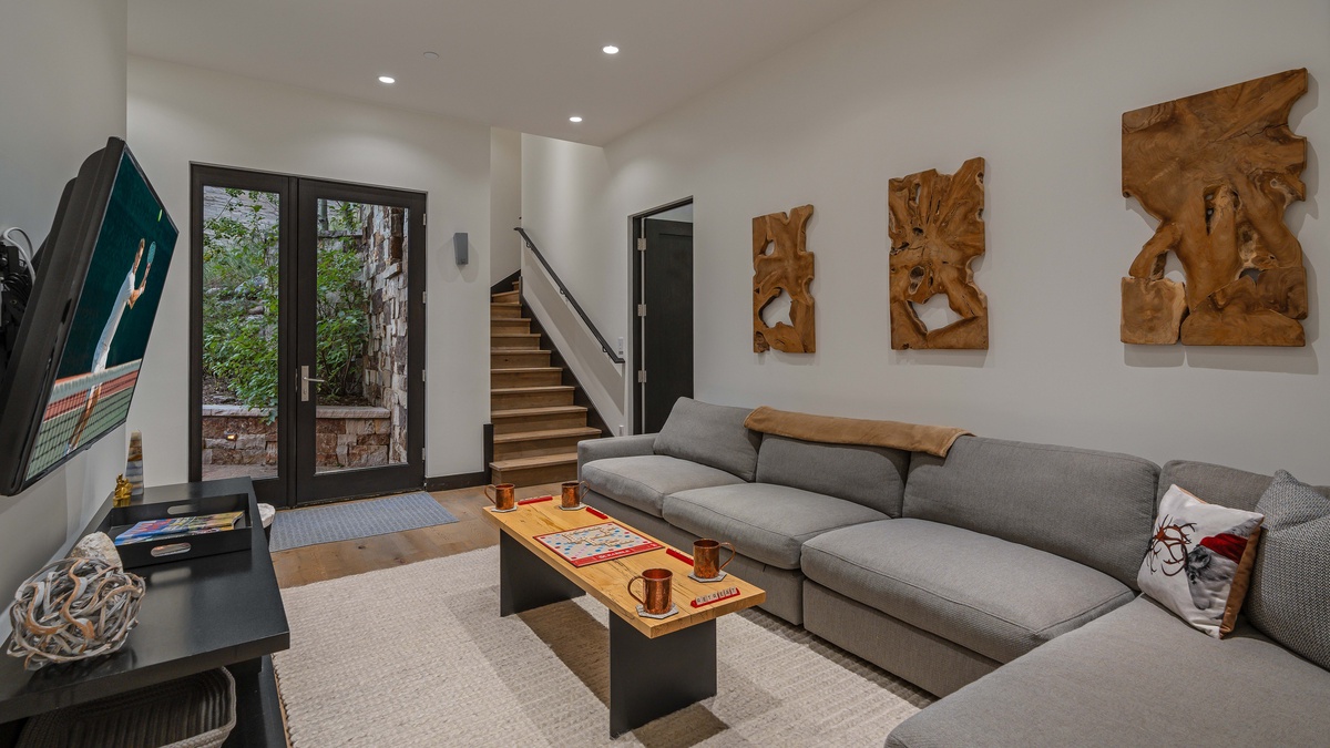 Family room on lower level just steps away from the hot tub