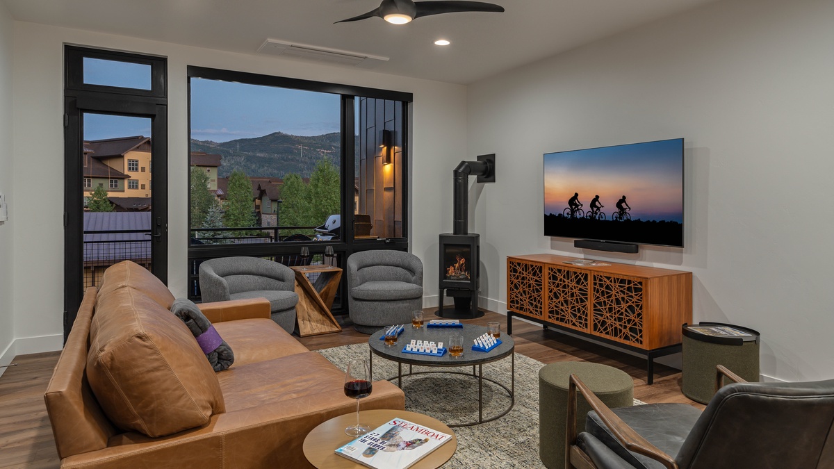 Great Room, Main Level - With gas fireplace and views