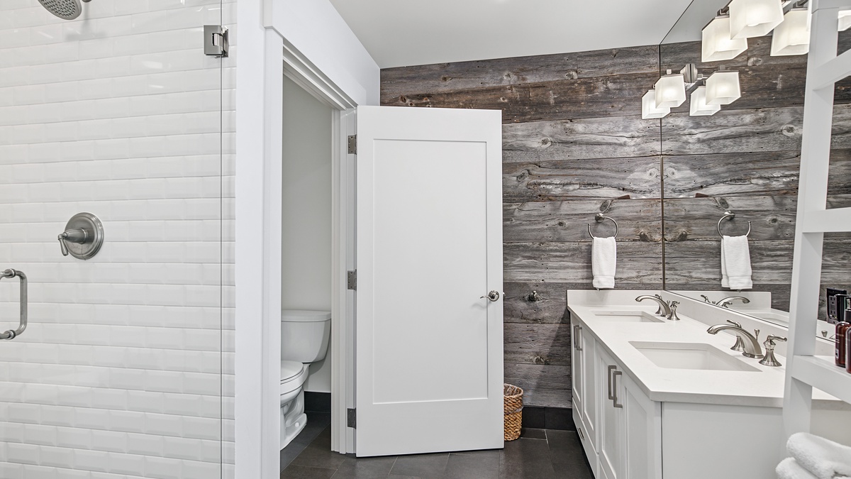 Shared Bathroom, Main Level - Hall bathroom adjacent to Bedroom 2 with walk-in shower