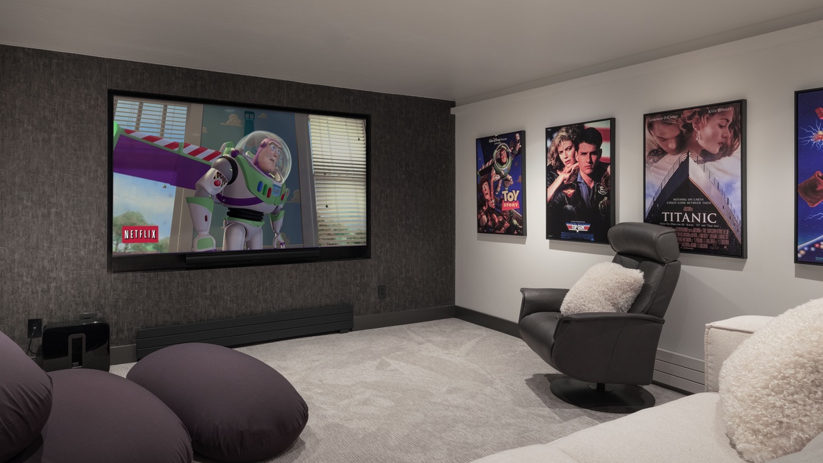 Theater Room, Lower Level - Media room with screen and seating
