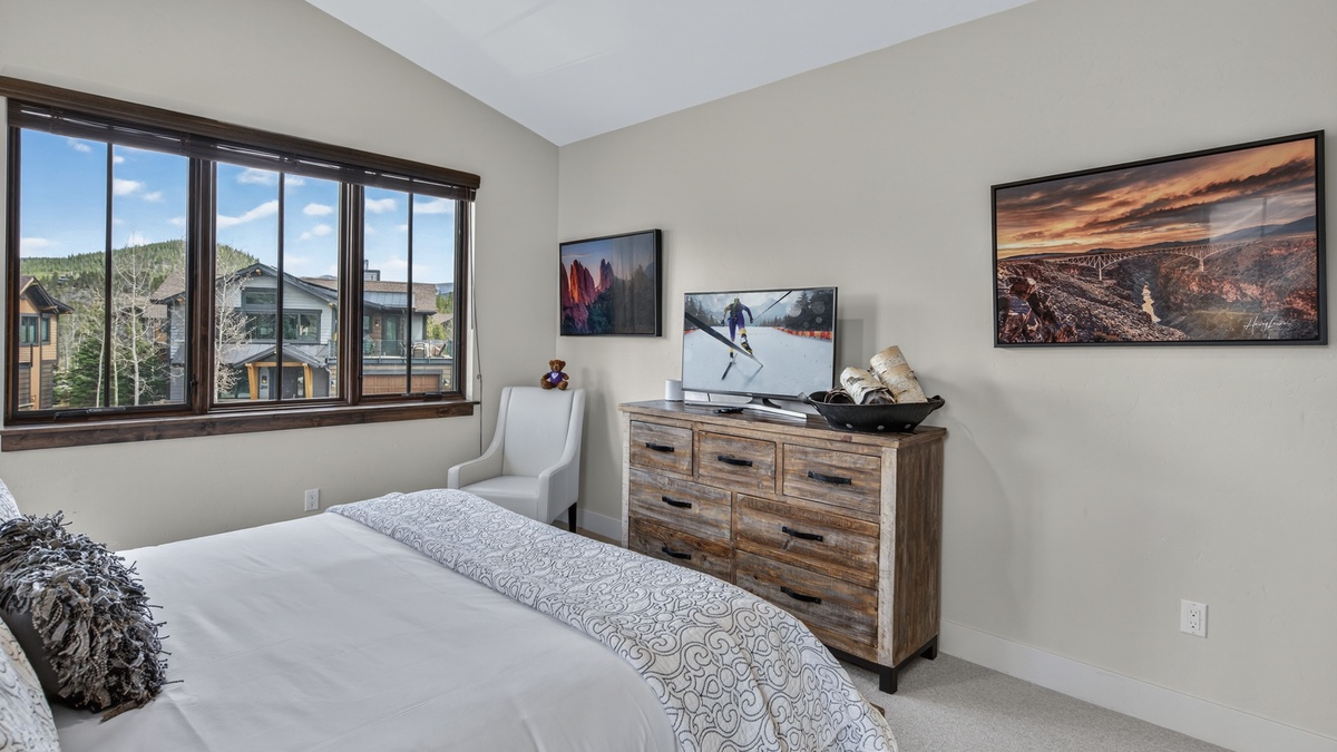 Bedroom 3, Upper Level - King bedroom with dresser and TV