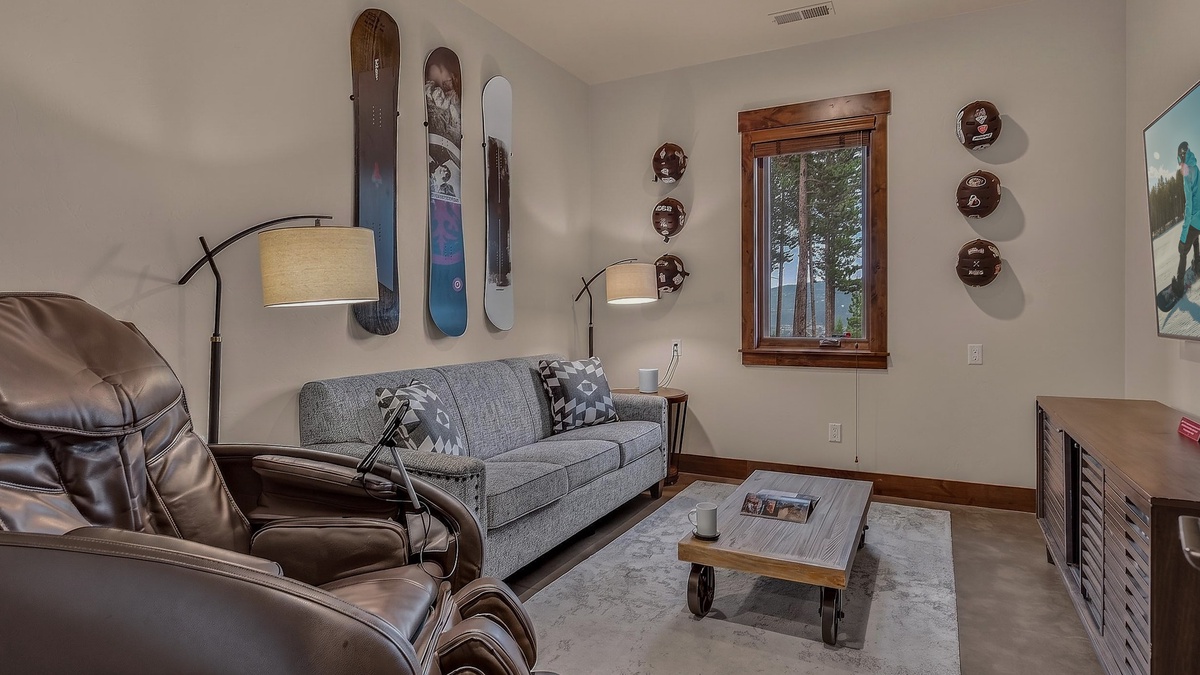 Family Room, Lower Level - Seating area with sofa and massage chair