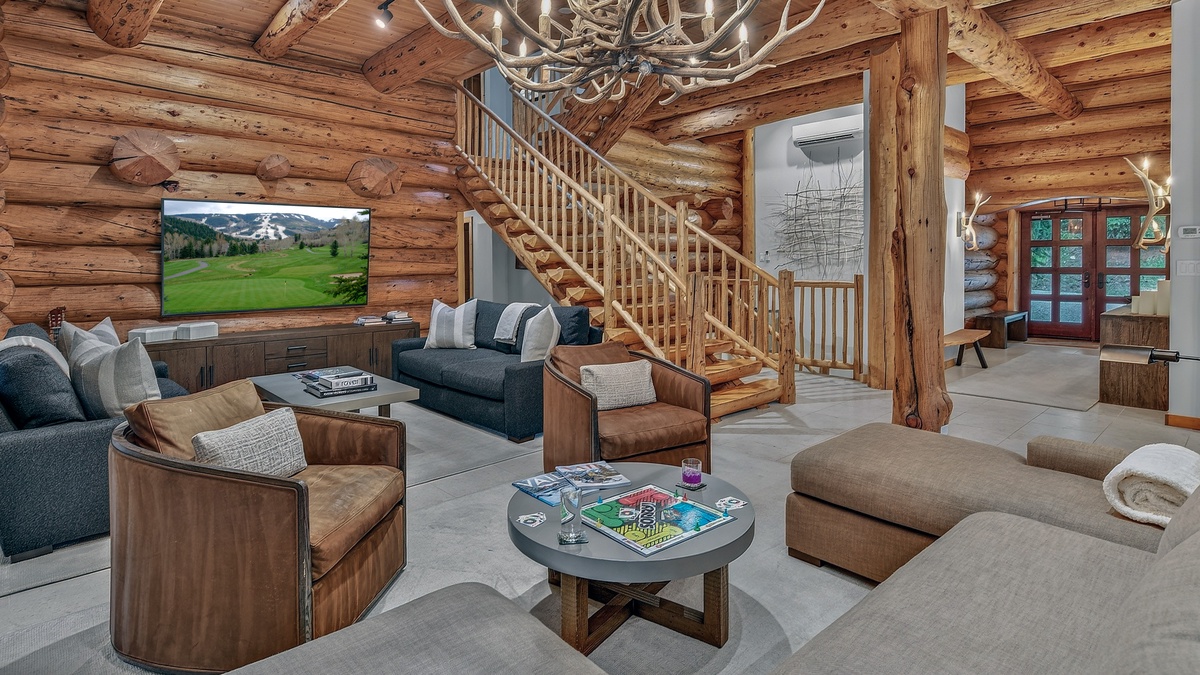 Great Room, Main Level - Seating area with large television