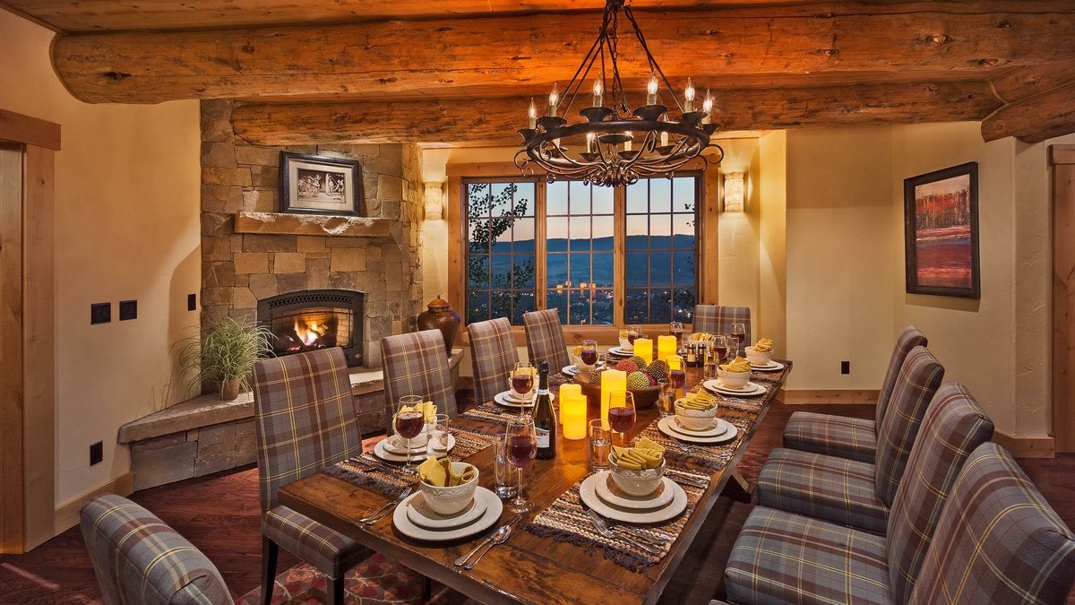 Dining area with fireplace and beautiful views, south side