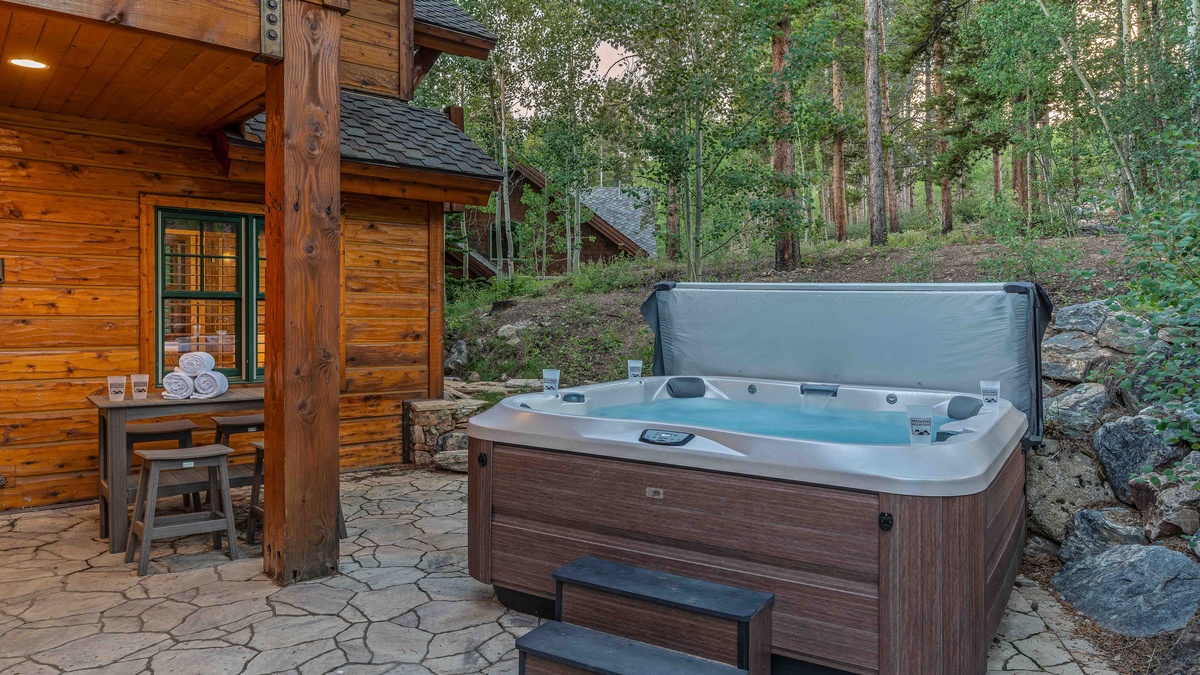 New hot tub with luxury patio furniture