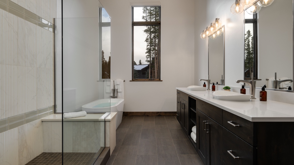 Bedroom 1, Main Level - Primary ensuite with a soaking tub and shower