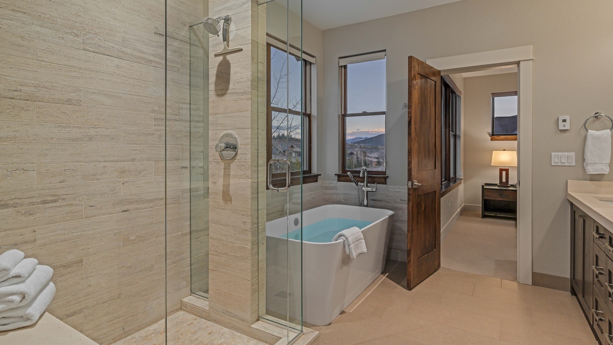 Bedroom 1, Main Level - Primary ensuite on main level with shower and soaking tub