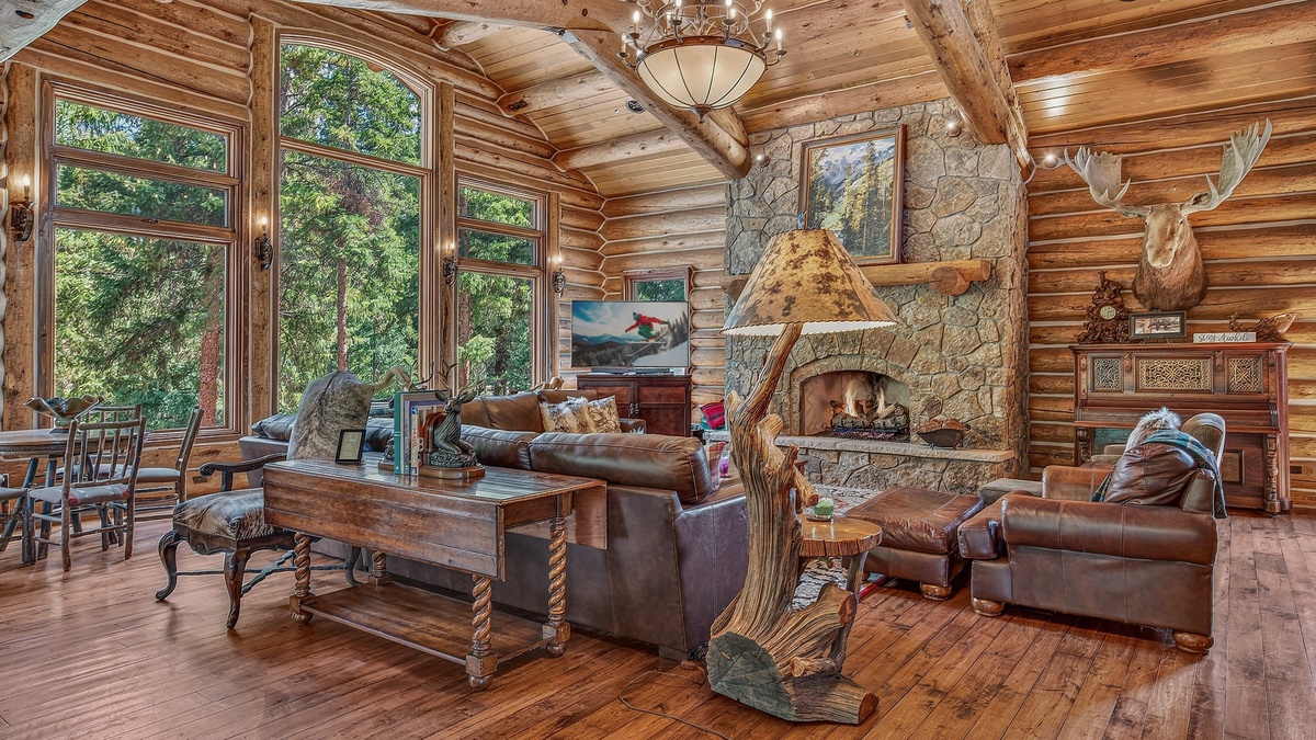 Great Room, Main Level - Seating area beside stone fireplace