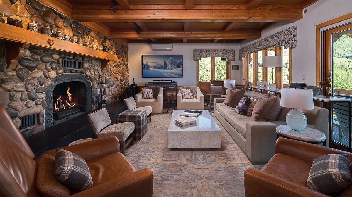 Great Room, Main Level - Fireplace with TV and seating area