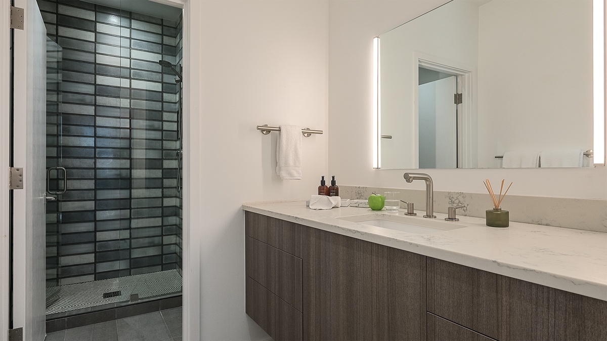 Bedroom 1, Lower Level - Ensuite with single vanity and shower
