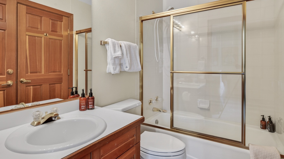 Shared Bathroom, Main Level - Hall bathroom adjacent to Bedroom 2