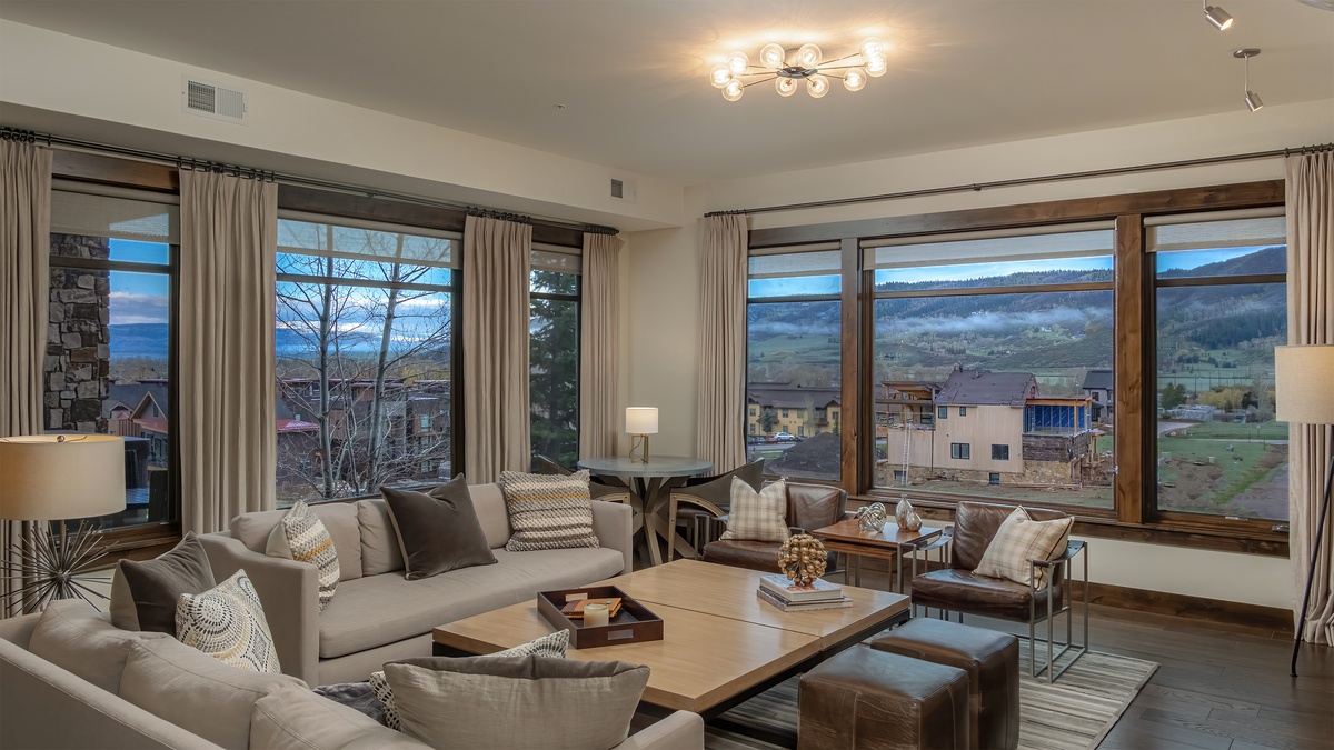 Great Room, Main Level - With expansive windows and mountain views