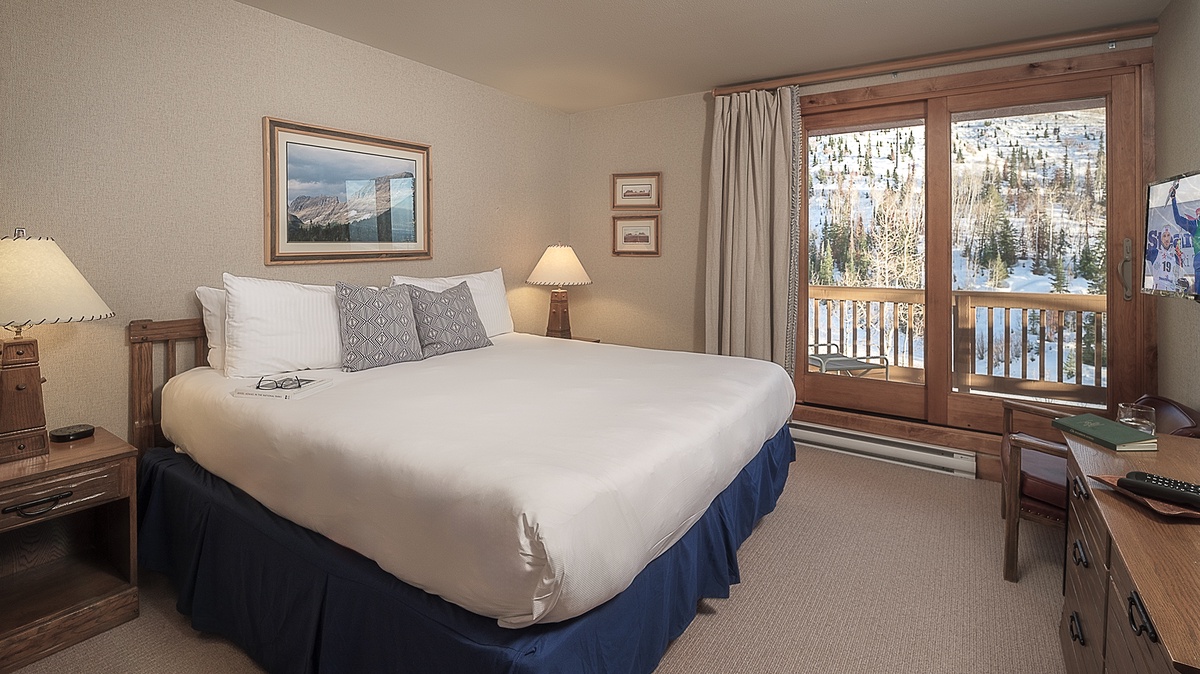 Bedroom 1, Upper Level - Primary king suite with deck access