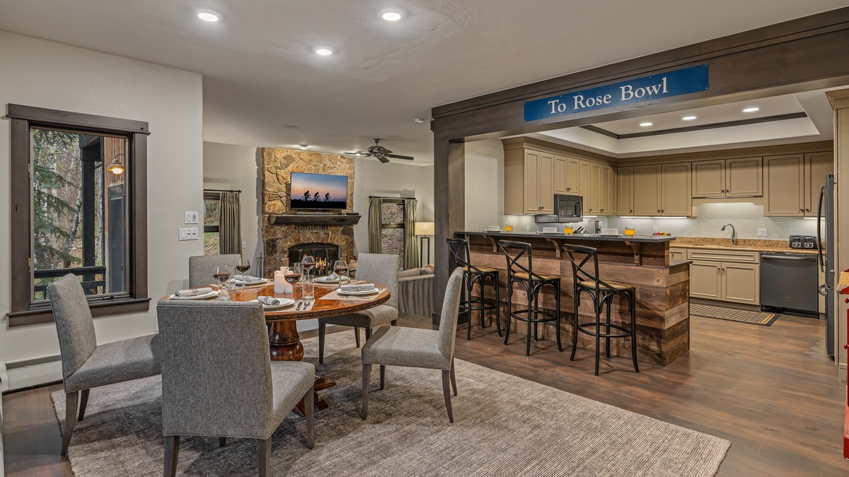 Guest apartment on the middle (3rd) level with dining area, kitchen, and breakfast bar