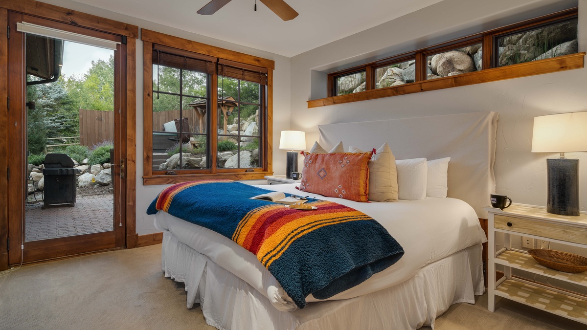 King suite with patio access on main level