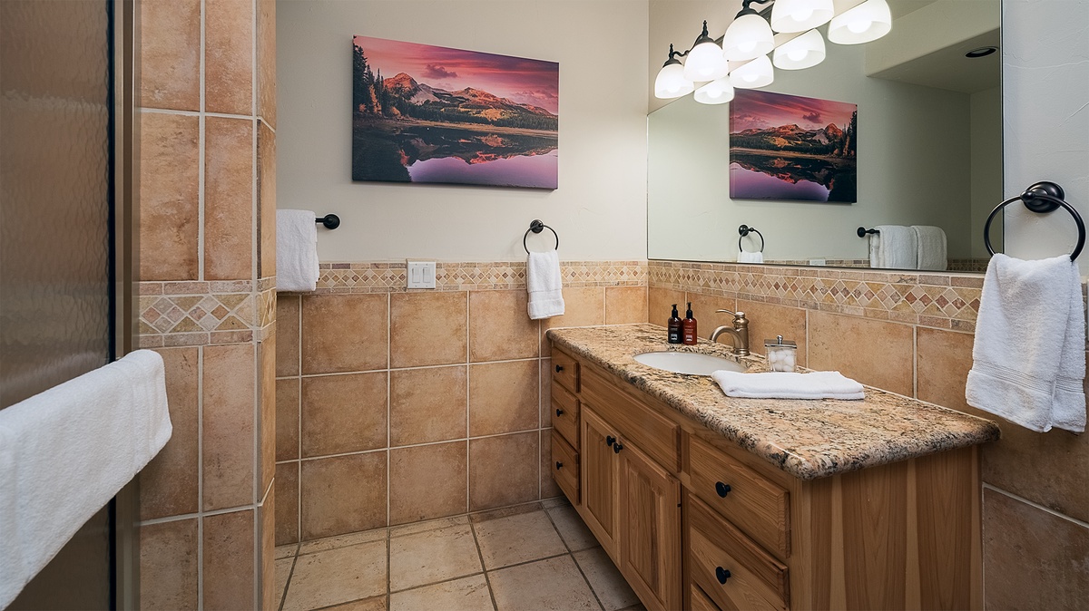 Shared Bathroom, Lower Level - Hall bathroom adjacent to Bedrooms 2 and 3