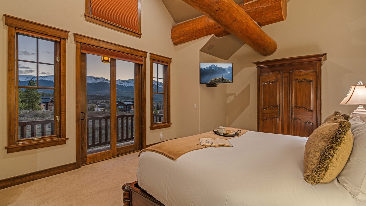Bedroom 1, Main Level - Main level primary king suite with balcony, views, and TV