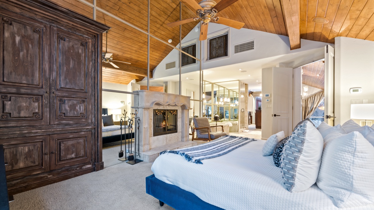 Primary Bedroom with fireplace - North