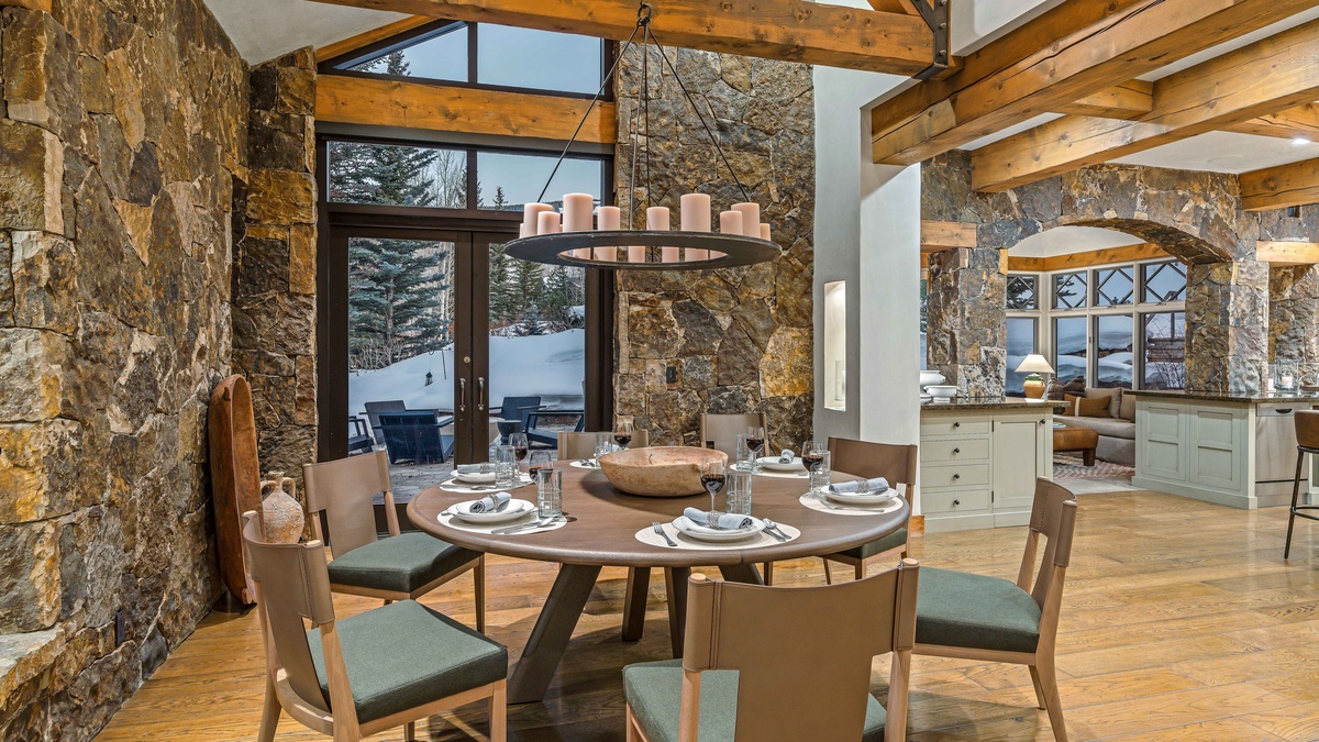 Dining area seats six, with main patio access