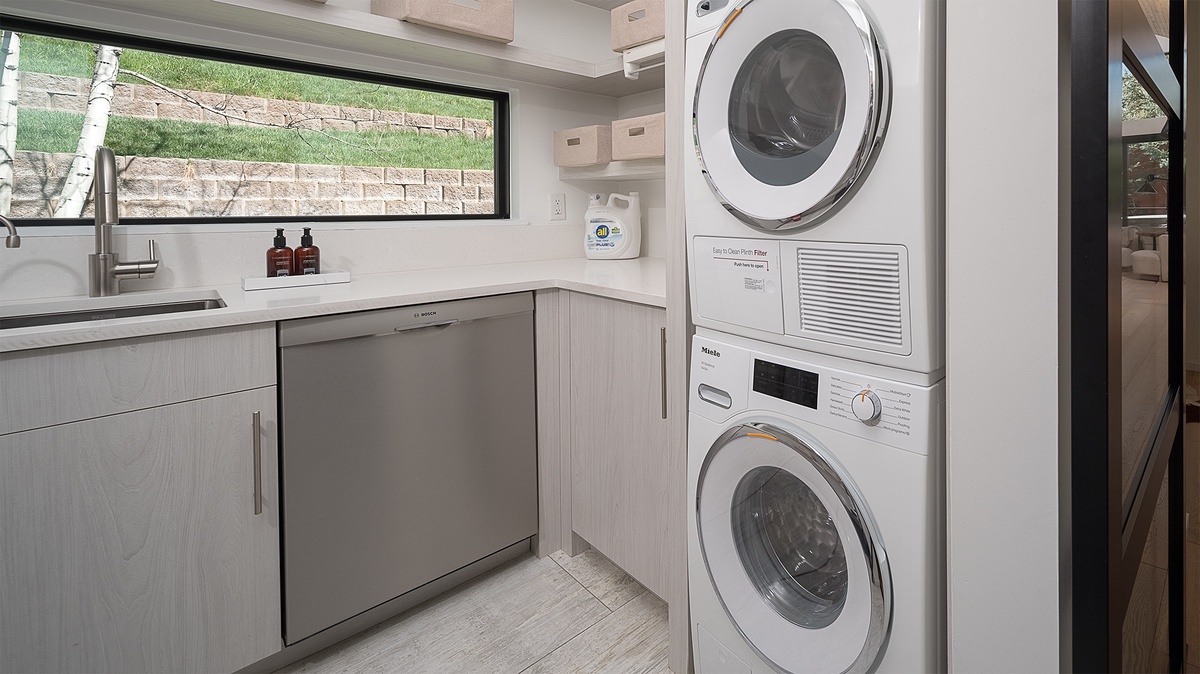 Laundry, Main Level - Stacked washer and dryer
