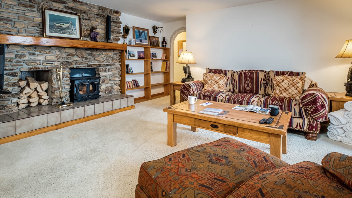 Lower level living room with fireplace