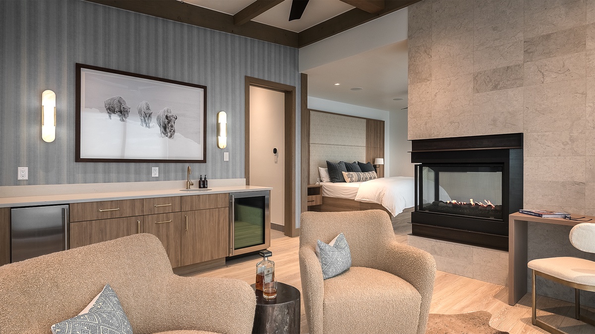 Bedroom 1, Upper Level - Riverlight Lodge primary king suite with bar and additional seating area
