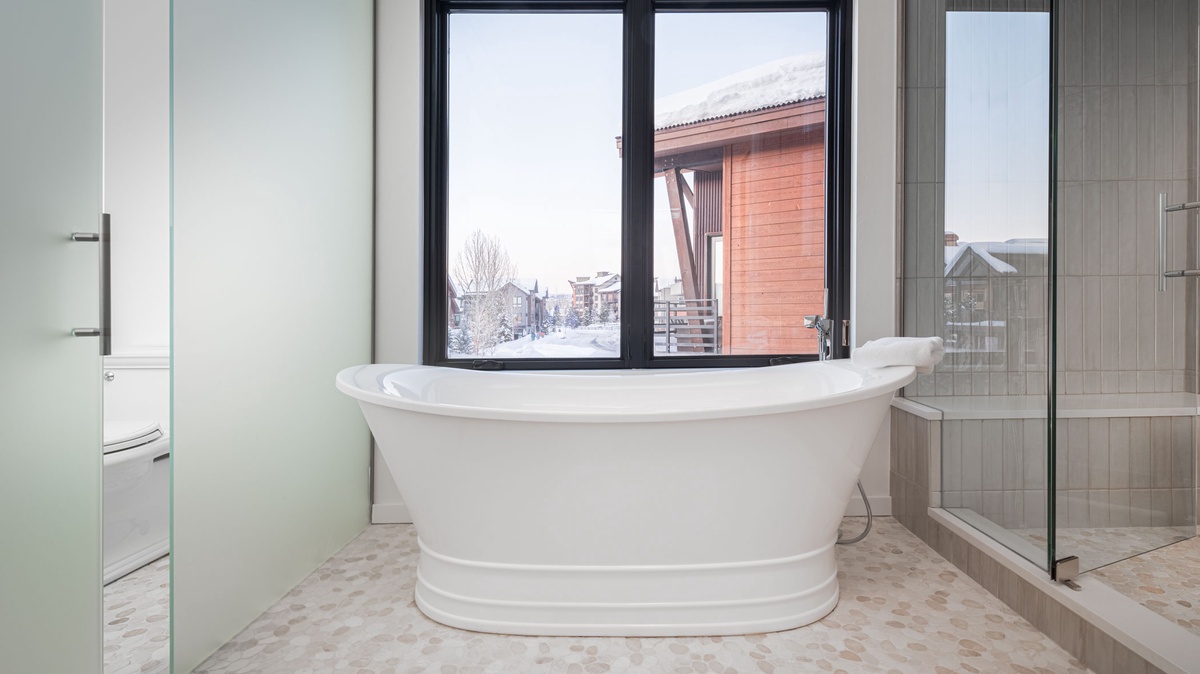 Bedroom 1, Upper Level - Ensuite with soaking tub and window views