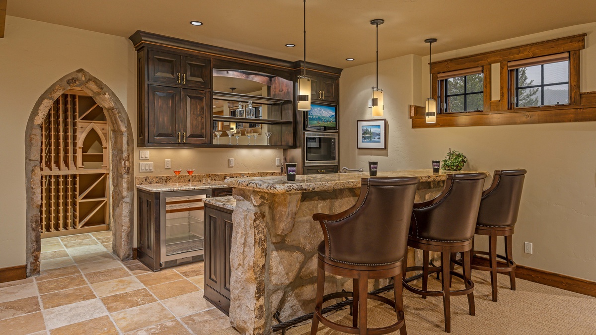 Wet bar and hot-top seating in lower level family room