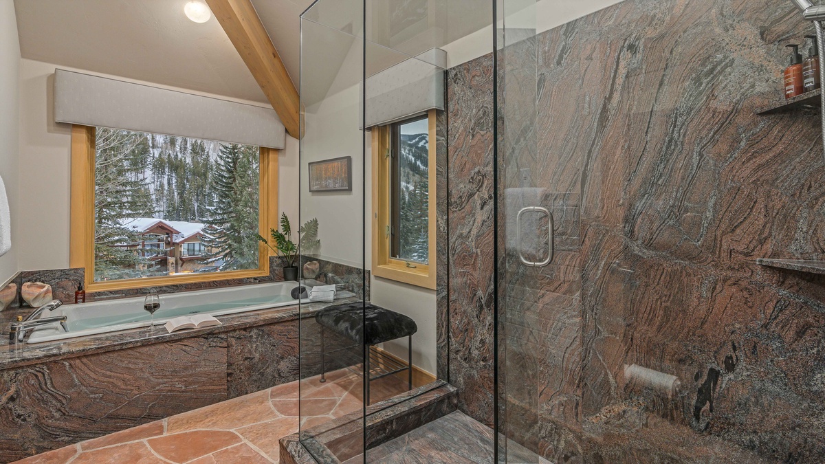 Bedroom 1, Upper Level - Primary king ensuite with large walk-in shower and spa tub