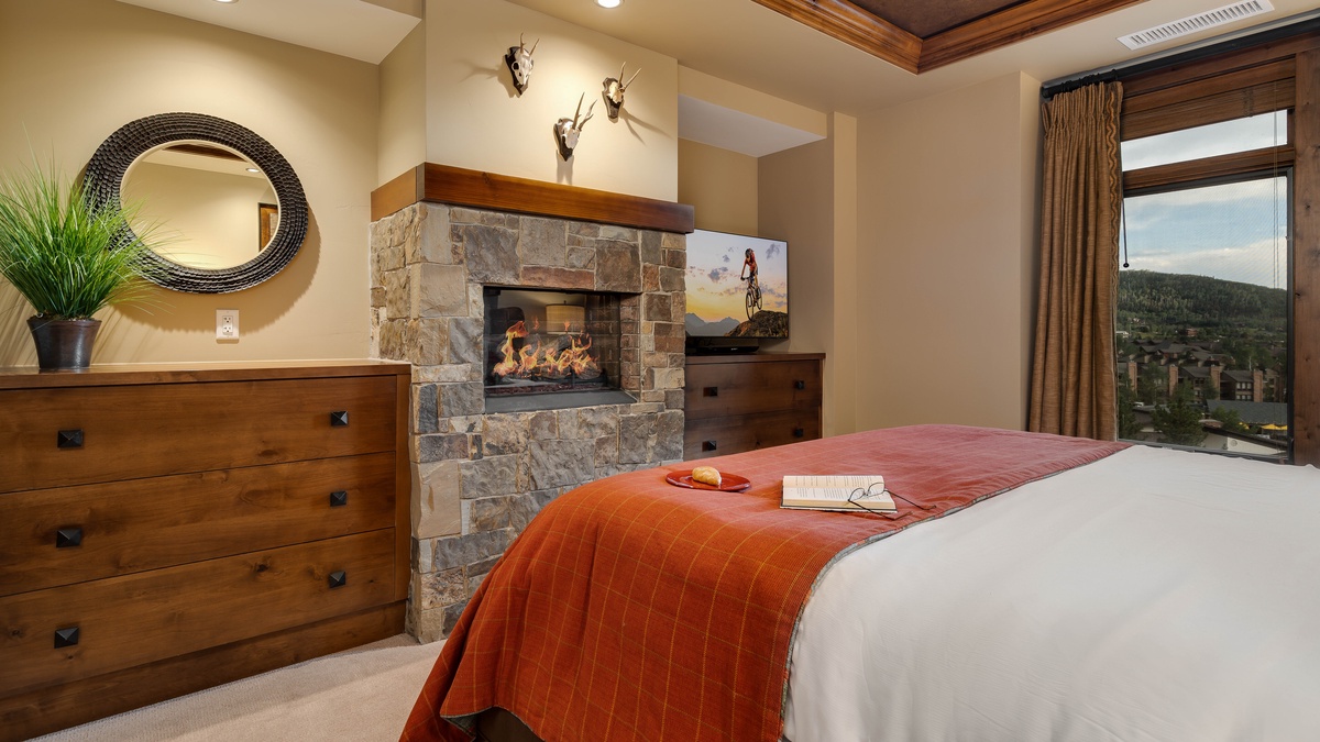 Bedroom 1, Main Level - Primary king suite with fireplace