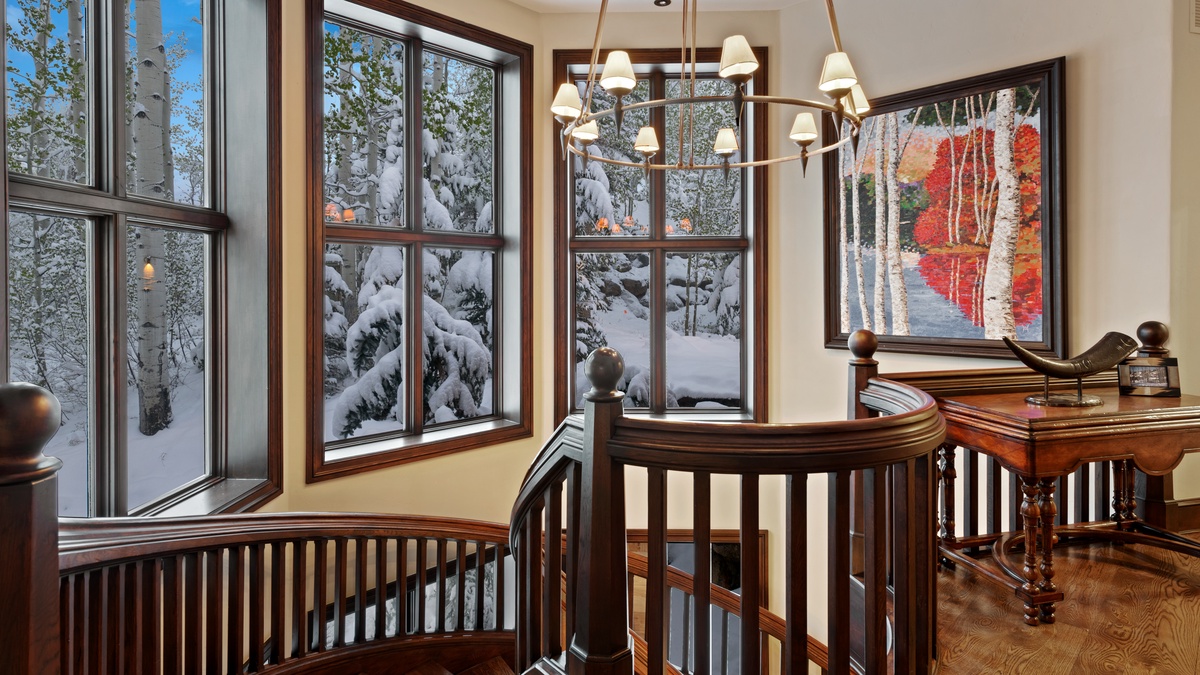 Chandelier over the staircase to the lower level