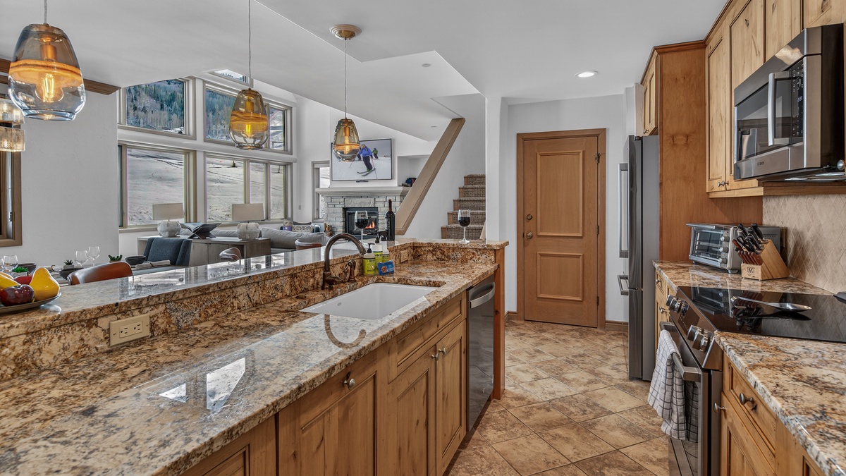 Kitchen, Main Level - Looking out to living area and views of ski slopes