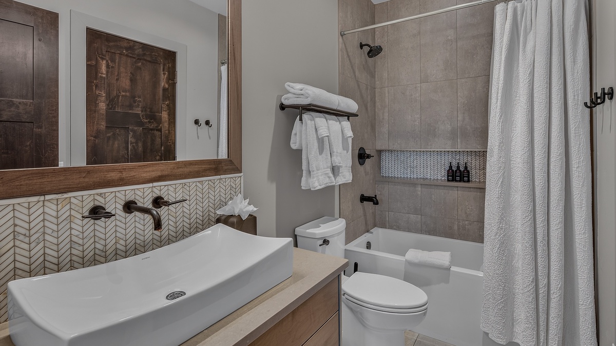 Bedroom 2, Lower Level - Ensuite with single vanity and walk-in shower