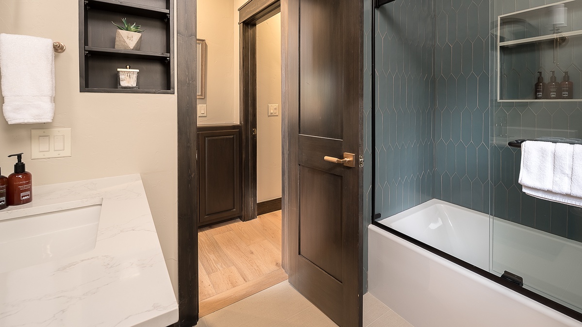 Hall Bathroom, Main Level - Vanity and tub shower combo