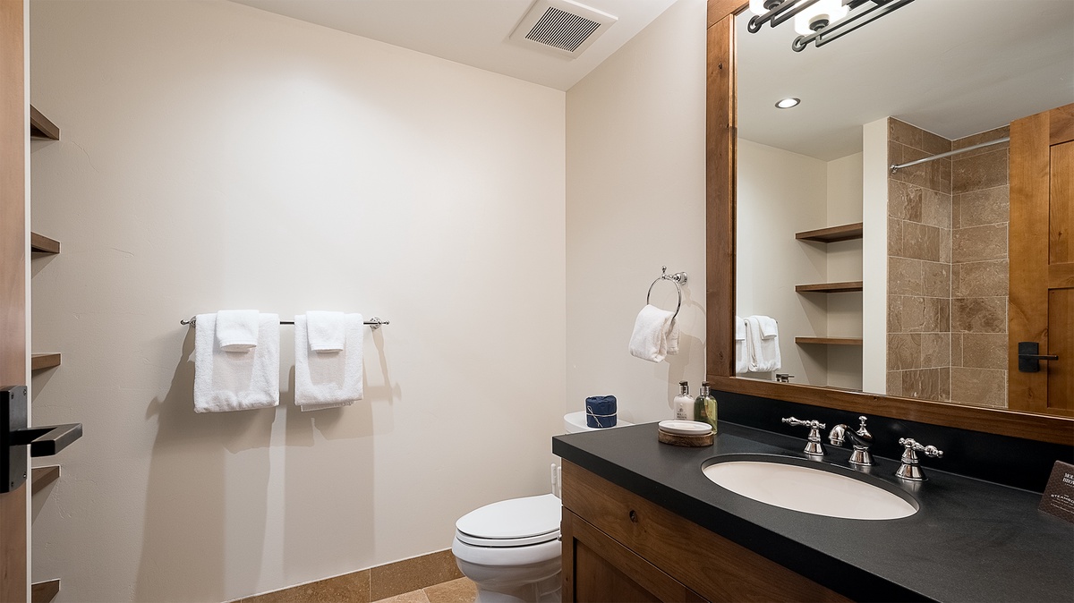Bedroom 3, Main Level - Ensuite with single vanity and toilet