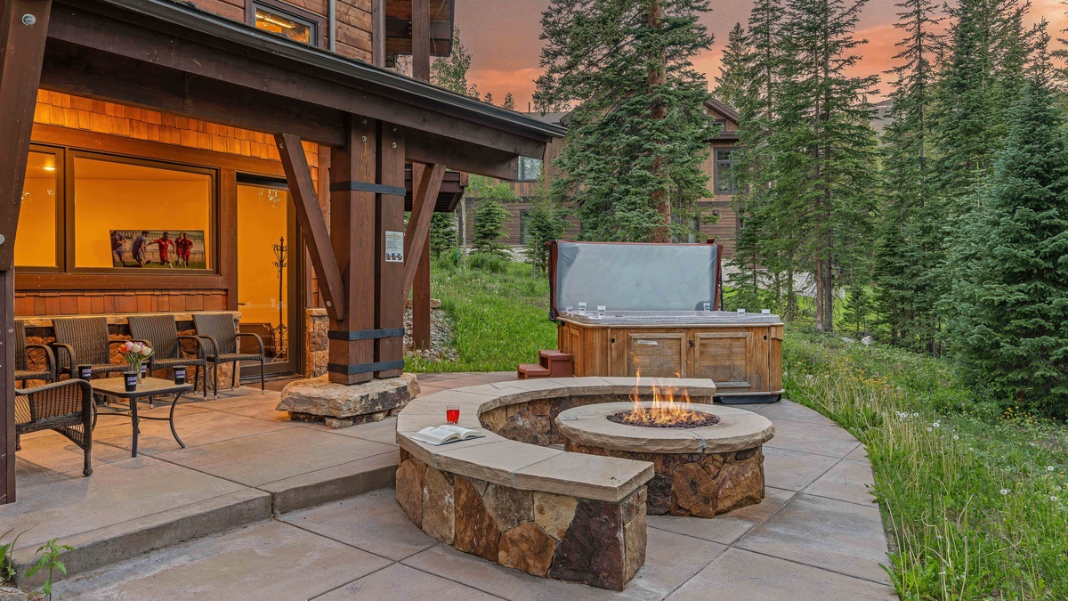 Hang out on the lower level patio with gas firepit, hot tub, and plenty of seating