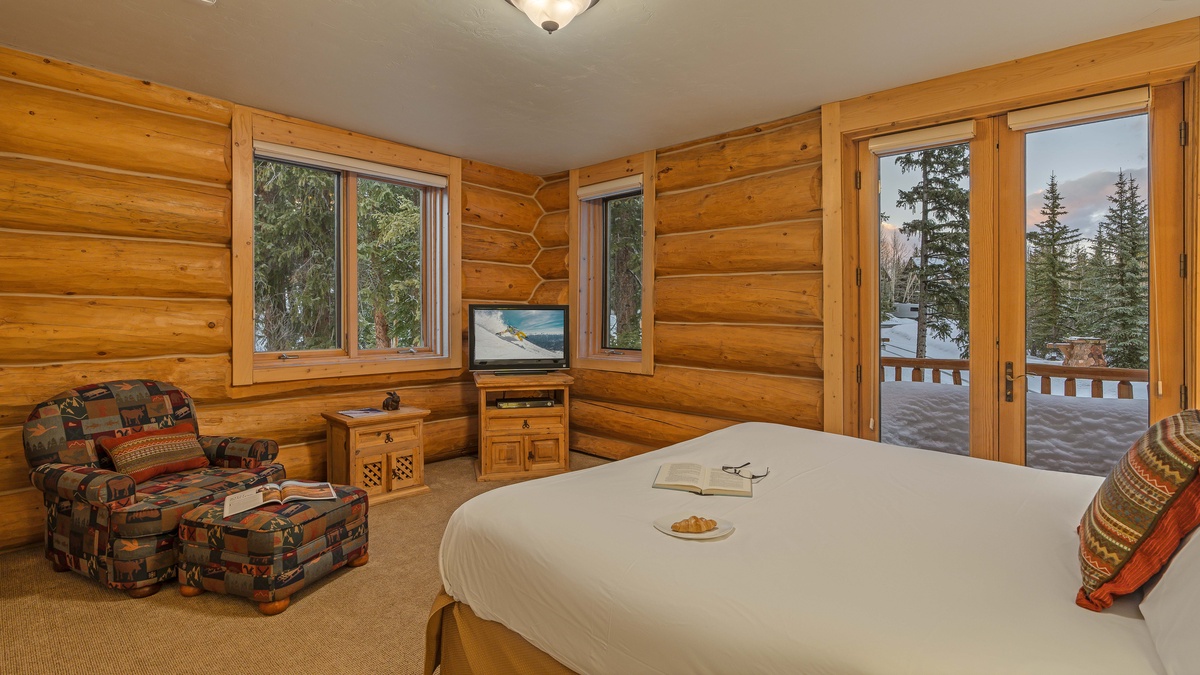 Bedroom 2, Main Level - King suite on main level with TV and balcony access