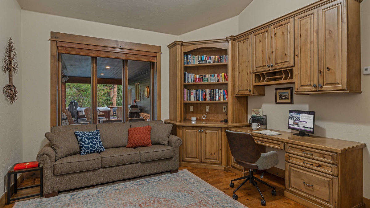 Main level private office with queen sofa bed
