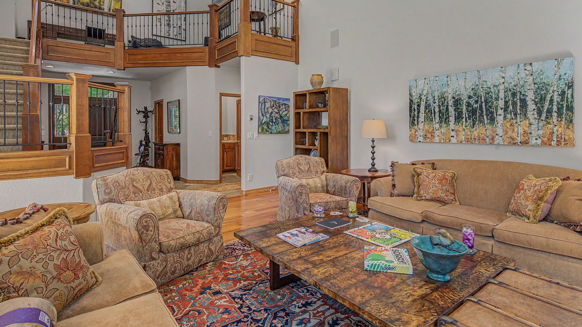 Great Room, Main Level - Open seating area with staircase view