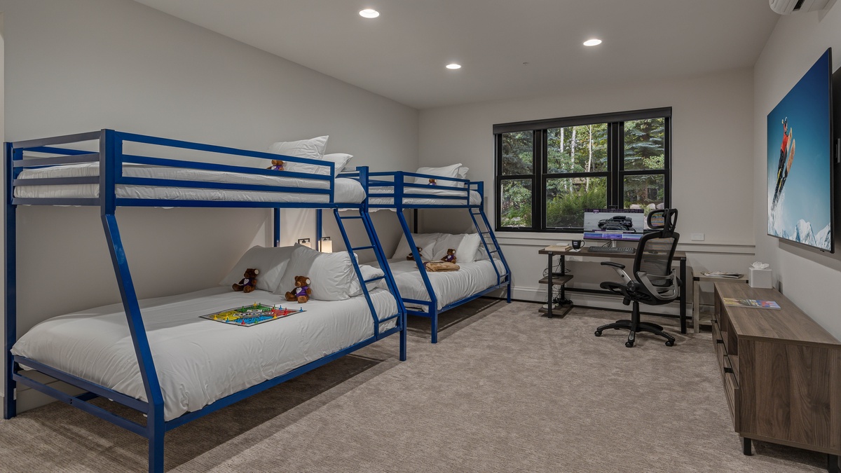 Bedroom 5, Lower Level - Bunkroom on lower level with office desk and chair