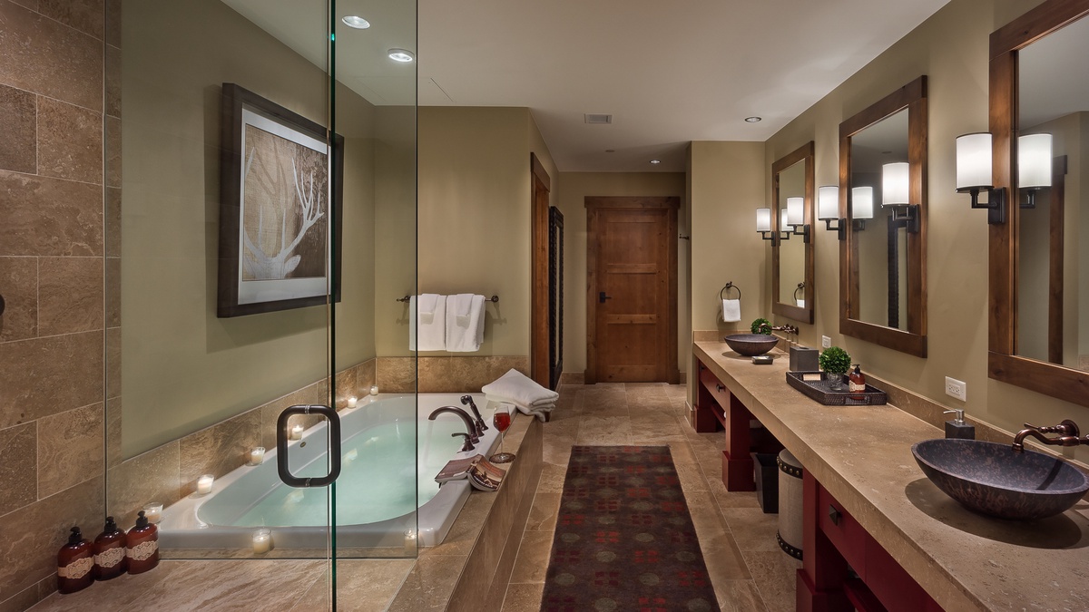 Bedroom 1, Main Level - Primary ensuite with soaking tub and walk-in shower