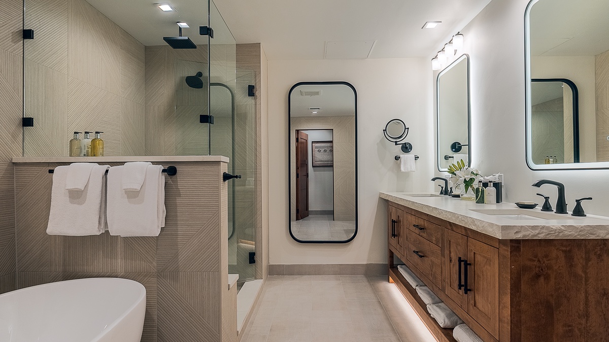 Bedroom 1, Main Level - Primary ensuite with single vanity and walk-in shower