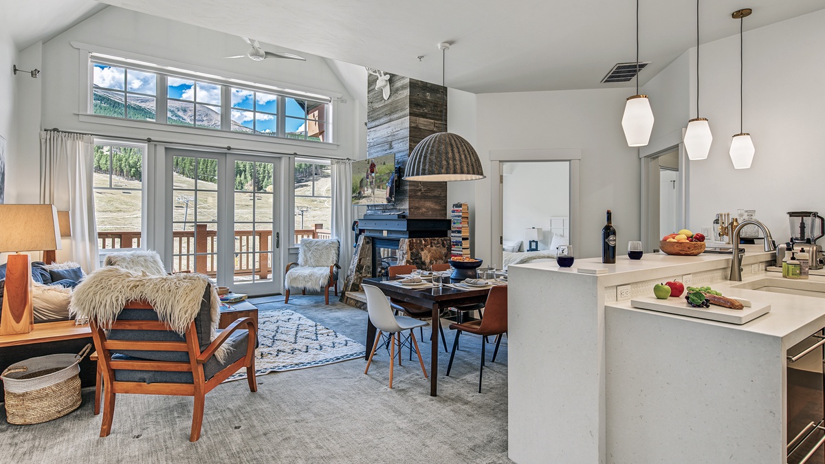 Great Room in Summer, Main Level - Fireplace with TV and seating area