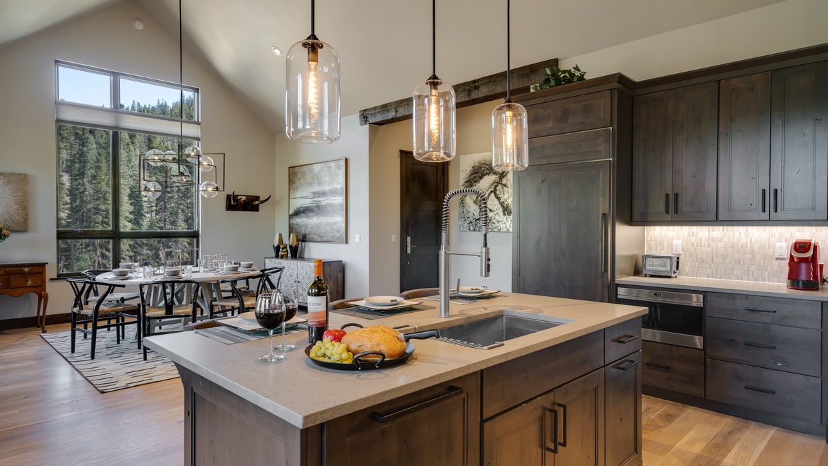 Kitchen opens to dining area