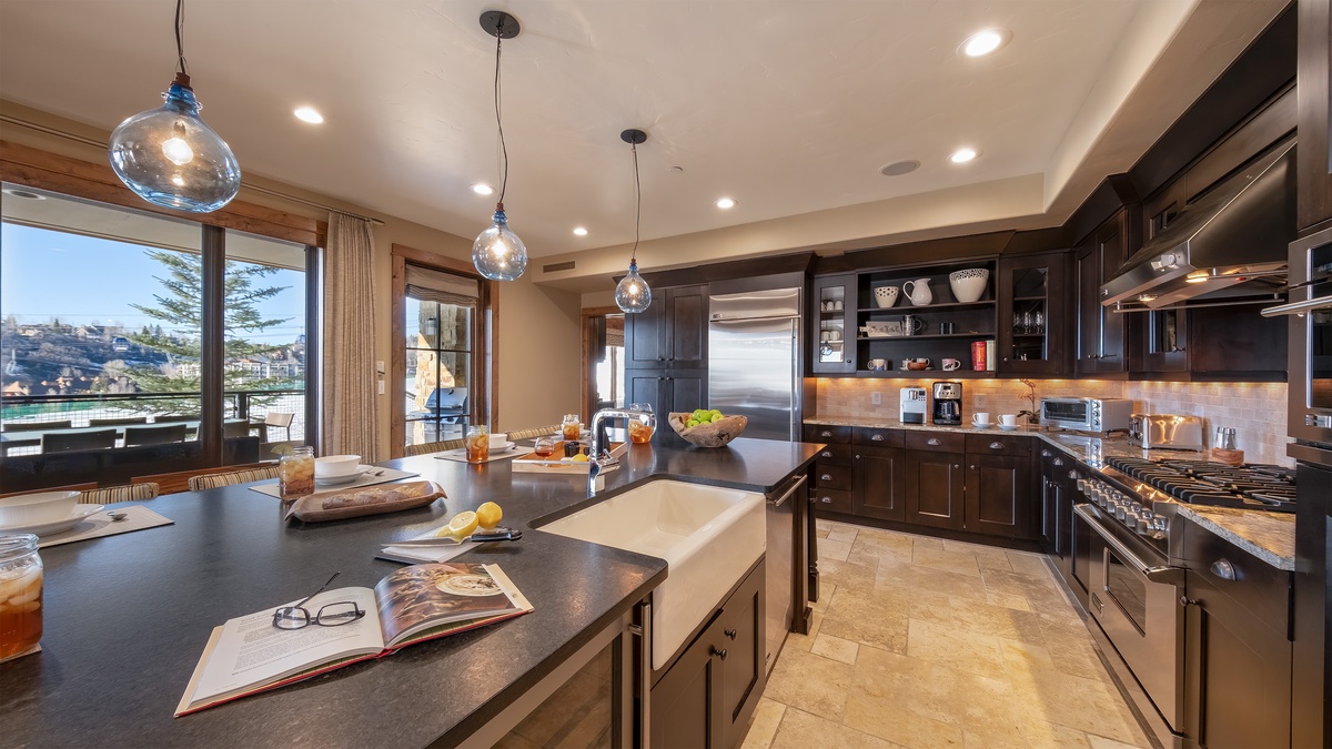 Kitchen, Main Level - Open layout with bar seating and views
