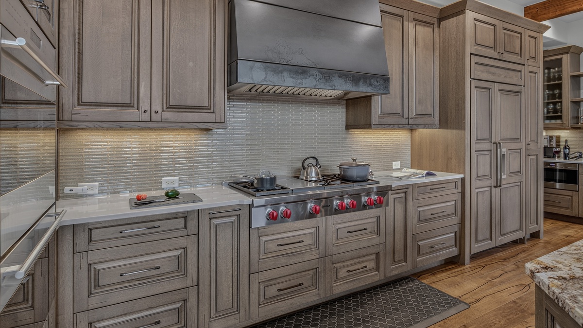Kitchen, Main Level - Range with surrounding cabinetry